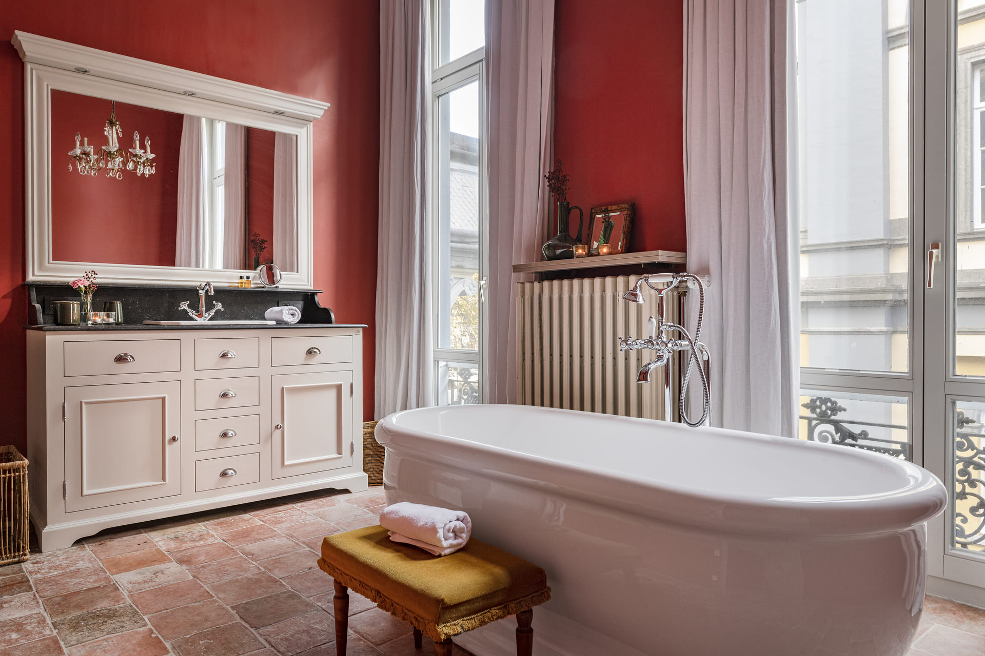 Bathroom with large bathtub and view of the city of Bruges 1